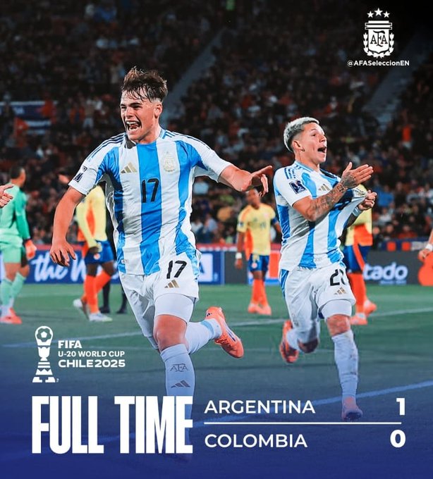 Two Argentine soccer players in blue and white striped jerseys numbered 17 and another, one with shaggy hair and the other with gray hair and tattoos, running and smiling in celebration on a green field during a match, with a stadium crowd in the background, Adidas logos on jerseys, FIFA U20 World Cup Chile 2023 branding at the bottom, and a scoreboard overlay reading FULL TIME ARGENTINA 1 COLOMBIA 0.