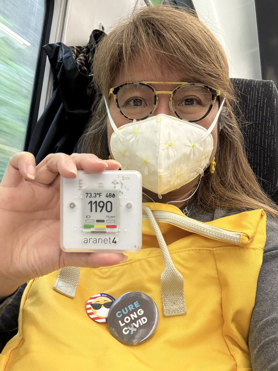 “I mask up on the <a href="/GWRHelp/">GWR</a> train to see my son who started attending a graduate program in U.K.”—Behind the Zimiair Daisy is #MaskTogetherAmerica Founder <a href="/MsJulieSLam/">Julie S. Lam</a>. The selfie was taken before the strap broke. 🌼😷💔
