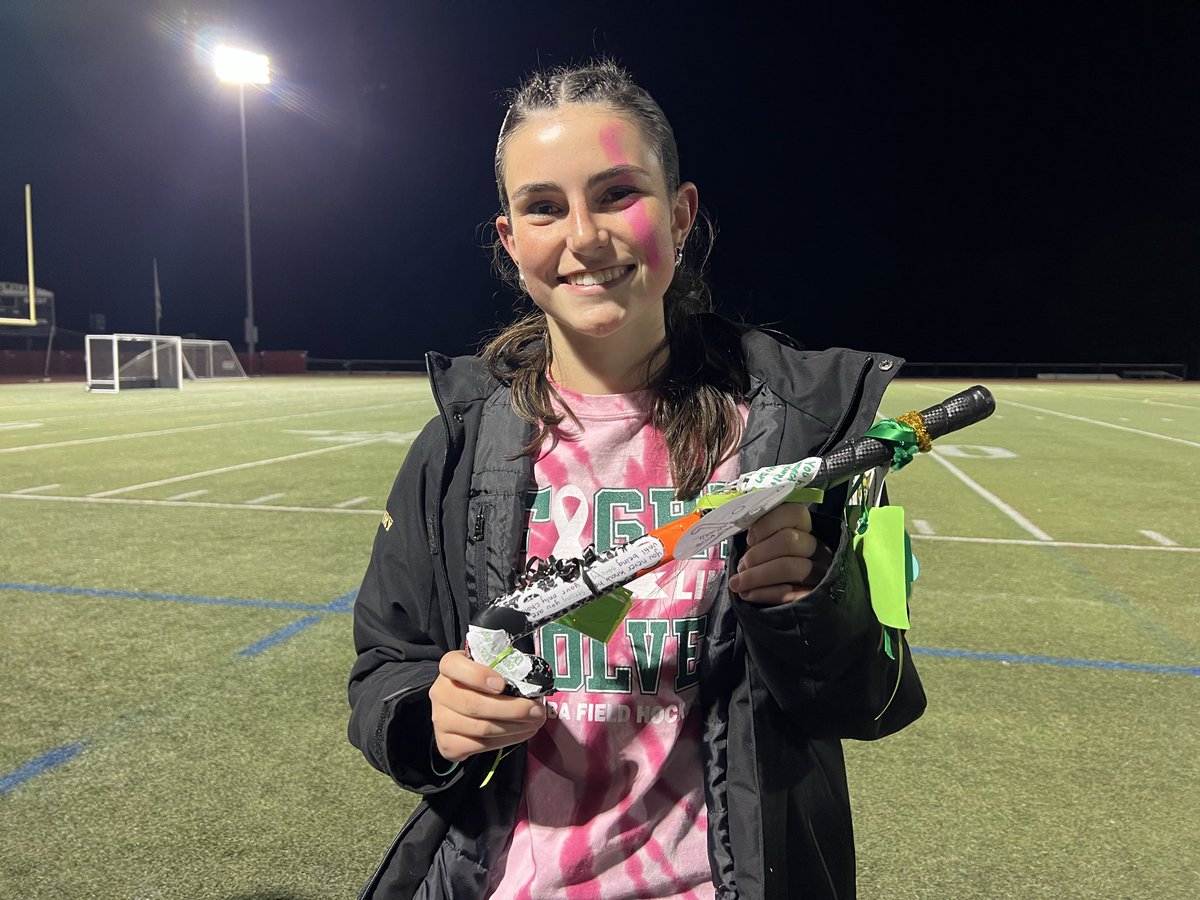 NashobaFH's tweet photo. Tonight was about more than field hockey. 🎗️It was about the people we play for. 💗 Those who’ve fought, are fighting, and those we’ve lost. Grateful to have our MS &amp; youth teams with us. Maddie Henry earns the stick for doing whatever the team needs.  #PlayForaCause https://t.co/wvty9bwkuT