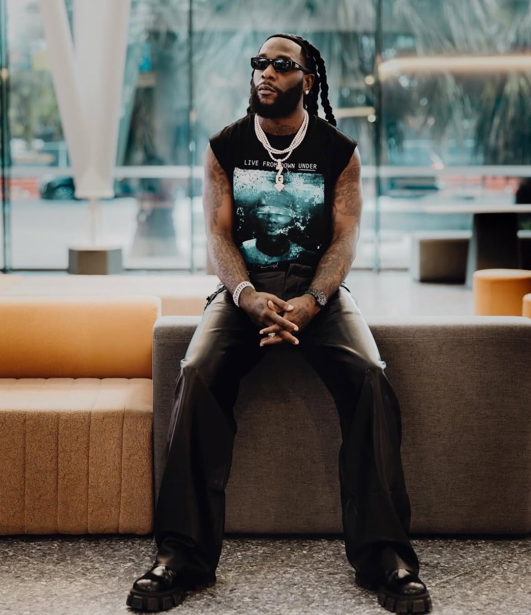 Burna Boy in new photos rocking the “No Sign of Weakness” merch 📸🤩