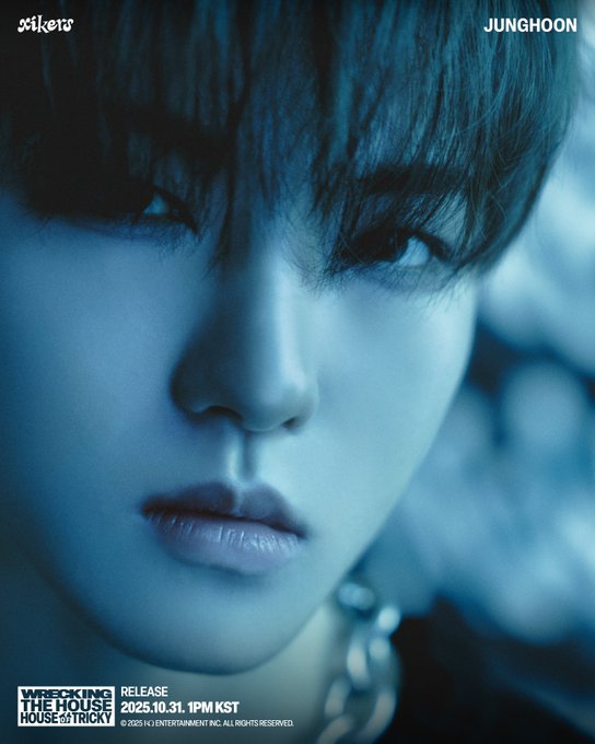 First image displays a young man with dark hair leaning forward in dark clothing against a blue background with graffiti elements and metal structures, text overlays include XIKERS logo, JUNG HOON name, and release details for House of Tricky Wrecking the House on 2025.10.31 1PM KST. Second image is a close-up of the same mans face with intense gaze, dark hair, subtle makeup, wearing a chain necklace, blue-toned background, with similar text overlays for the album and release information.