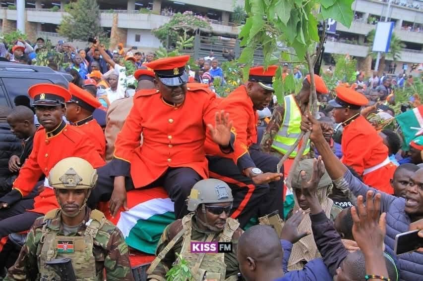 Jj865's tweet photo. 🇰🇪💔 The scene was powerful, Kenyan military had to sit on Raila Odinga’s casket to protect it. That’s how deep the love, grief, and emotion is running cross the nation. 🕊️ #RIPRailaOdinga #RailaOdinga #Kenya https://t.co/YZ8TXd5wat