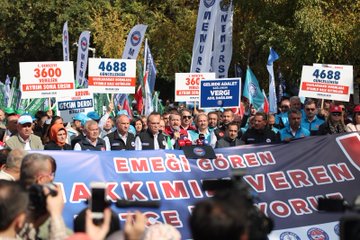 First image shows a group of men in suits and vests standing behind a podium with microphones from media outlets like A Haber during a speech with Turkish flags banners reading EMEĞİ GÖREN and party symbols in the background. Second image depicts a large crowd of protesters holding green and white flags and banners stating HAKKI EMEĞİ GÖREN BÜTÇE İSTİYORUZ with numbers like 3600 and 4688 visible on signs and a large horizontal banner emphasizing budget demands. Third image features participants including women in headscarves holding signs with 3600 and 4688 numbers and names like Ayşe Sönmez and Cengiz Demirkol alongside a blue banner about workers rights. Fourth image captures a wide view of a protest gathering with people in casual attire holding flags and a prominent red and blue banner HAKKI EMEĞİ GÖREN BÜTÇE İSTİYORUZ surrounded by media photographers and union emblems.