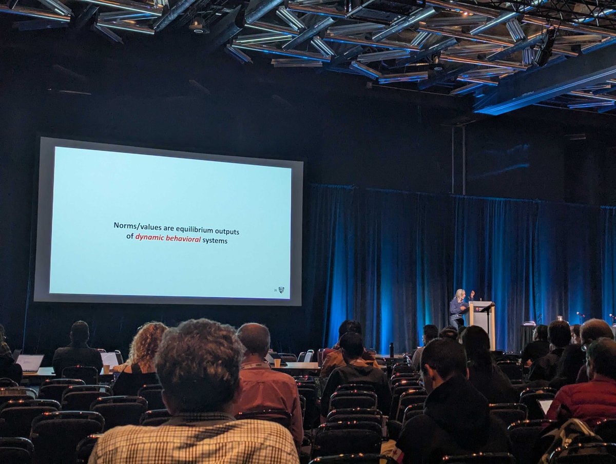 Grateful to keynote at #COLM2025. Here's what we're missing about AI alignment: Humans don’t cooperate just by aggregating preferences, we build social processes and institutions to generate norms that make it safe to trade with strangers. AI needs to play by these same systems,