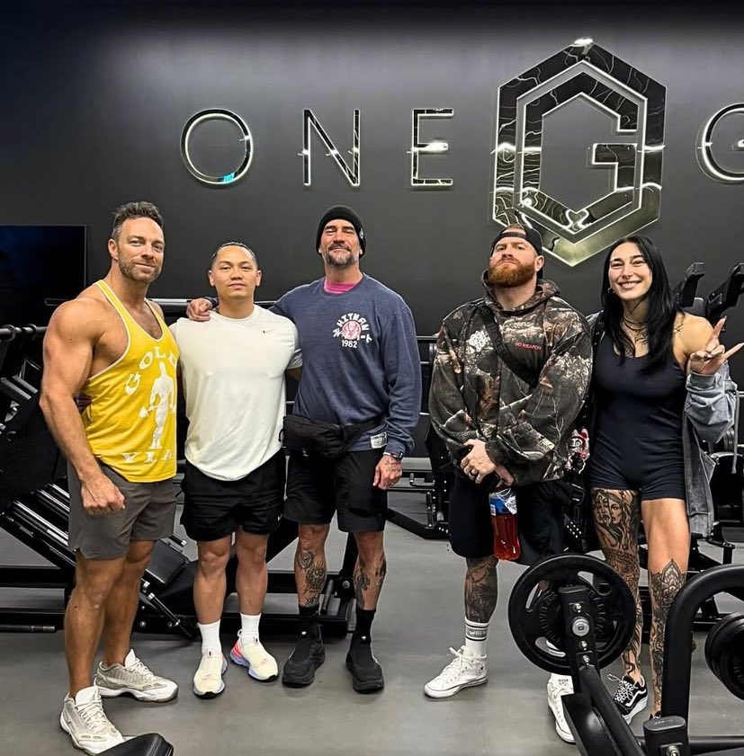 CM Punk with Buddy, Rhea and LA Knight