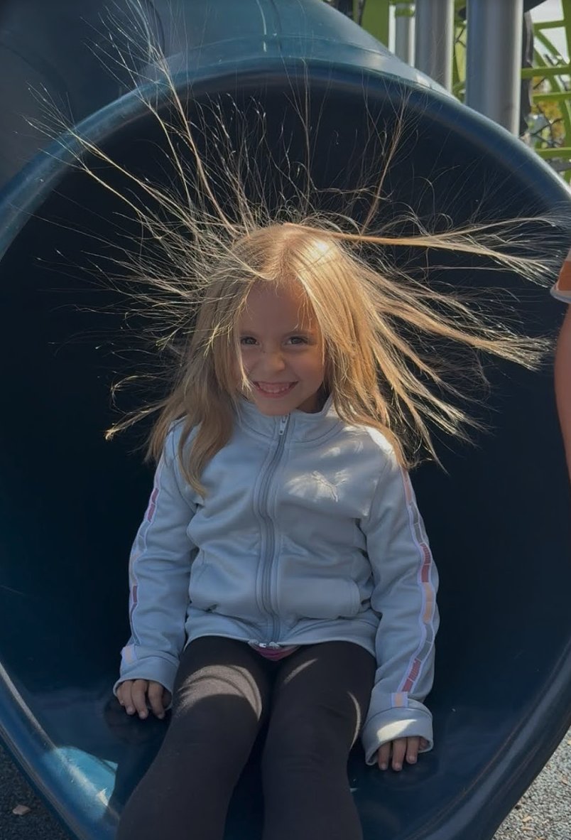Pure joy on the Puffer playground! 🌟All smiles as static from the slide made her hair stand straight up — a perfect moment of fun and happiness at recess. #pufferpride #dg58pride