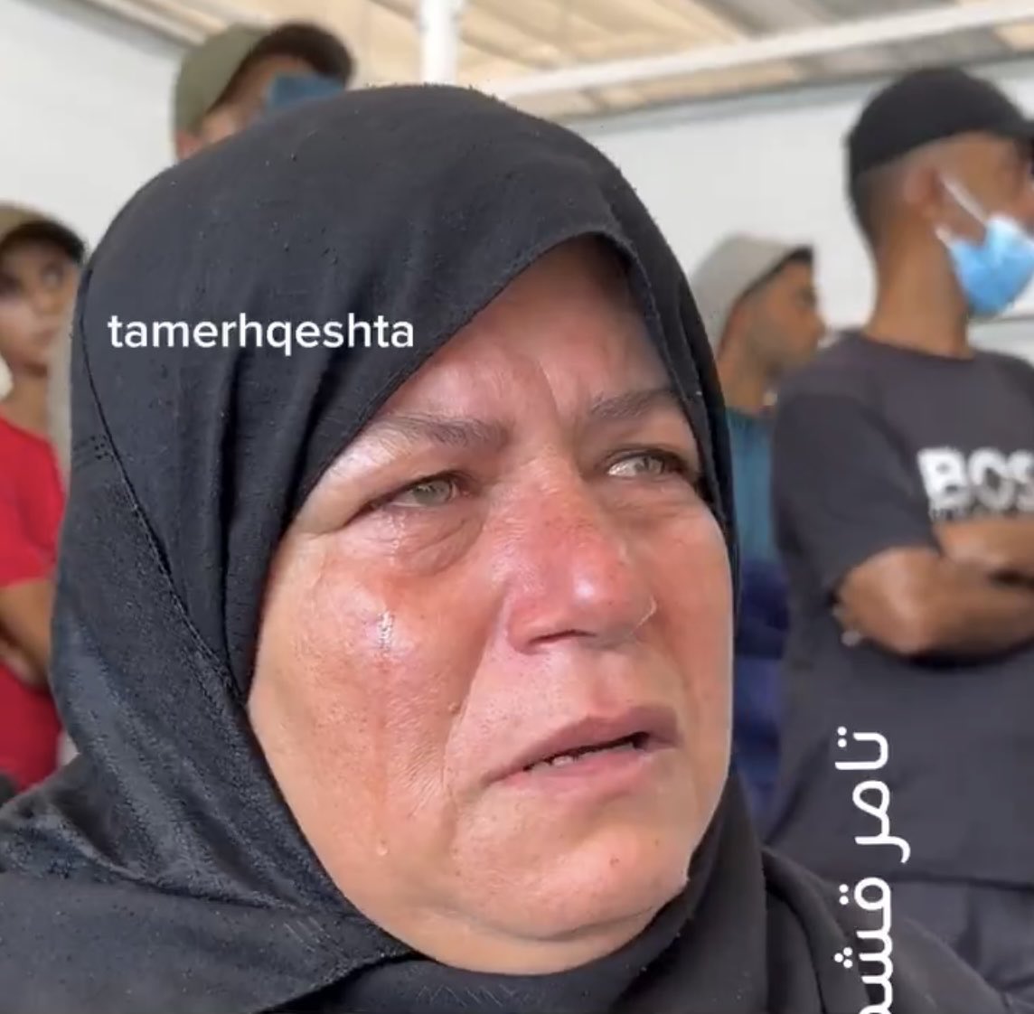 swilkinsonbc's tweet image. At Nasser Hospital southern Gaza, families gather before a large screen showing photos of tortured Palestinian bodies released by the israelis