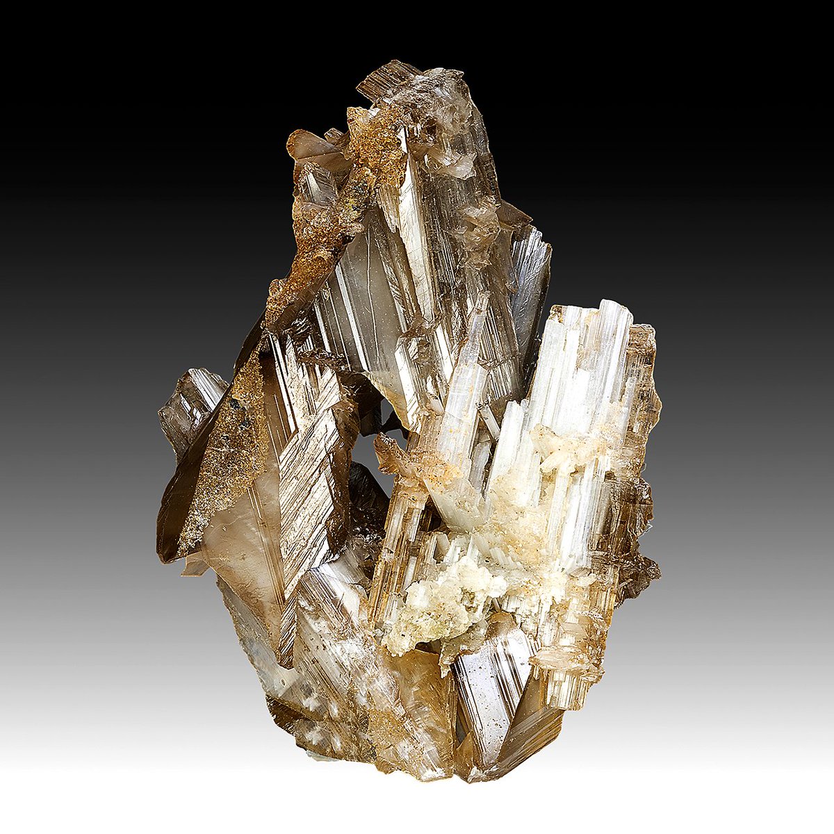 geologyBits's tweet photo. 🟥 ⛏️ Cerussite
is a lead carbonate mineral with the chemical formula PbCO₃, belonging to the aragonite group and crystallizing in the orthorhombic system.
❤️ 🔁 #Cerussite #LeadOre
🎞️ 📸 https://t.co/azK6mwcrg0
▶️ It commonly develops as prismatic, tabular, or apparently hexagonal twinned crystals, thanks to frequent reticular twinning along the plane.
It typically appears colorless, white, gray, blue, or green, with an adamantine to vitreous or dull luster, and exhibits a white streak.
Cerussite has a Mohs hardness of 3 to 3.5, making it relatively soft, and a high specific gravity of 6.53 to 6.57 due to its lead content, which also imparts brittleness and conchoidal fracture.
It shows distinct cleavage on {110} and {021}, is transparent to translucent, and effervesces vigorously in dilute acids; it may fluoresce yellow under UV light.
As an important ore of lead (and sometimes silver), it poses health risks from lead exposure and is known for pseudomorphs after other minerals like galena or anglesite.
▶️ Cerussite forms as a secondary mineral in the oxidized, near-surface zones of lead-bearing ore deposits, primarily through the supergene weathering and alteration of primary lead sulfides such as galena (PbS) in the presence of carbonated waters that leach and redeposit lead as carbonate.
This process occurs in arid to semi-arid environments where descending groundwater rich in CO₂ dissolves primary minerals, mobilizing lead ions that precipitate as cerussite in veins, cavities, or as replacements, often alongside other secondary minerals like anglesite, malachite, and smithsonite.
It is commonly associated with zinc-lead deposits and can constitute a significant ore resource in these oxidized caps.