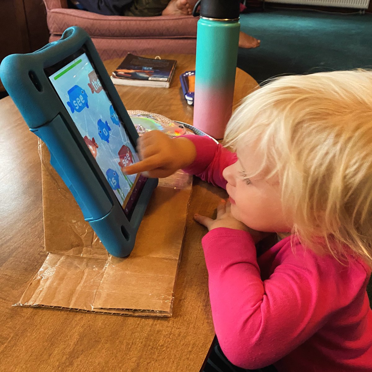 You can just make a tablet stand out of cardboard