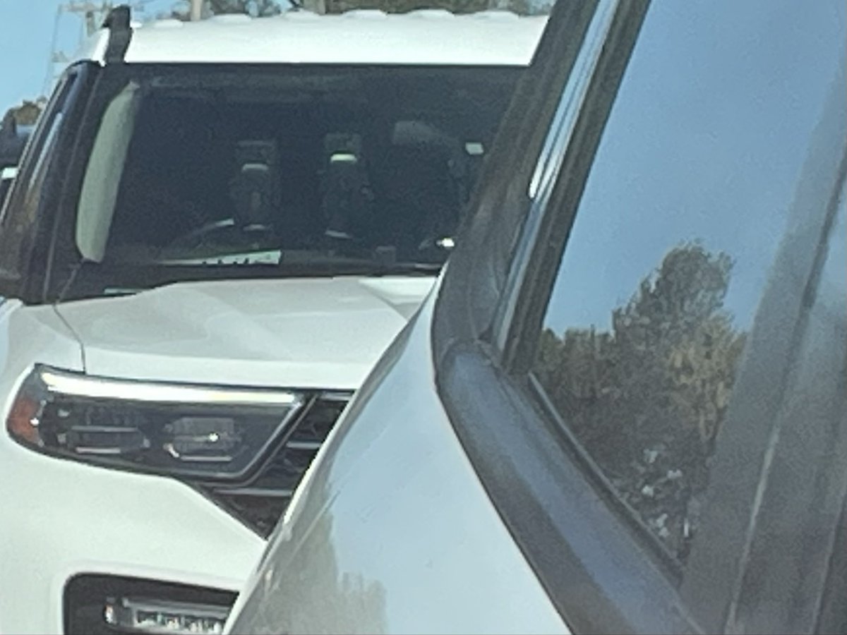 Was on assignment and Notice this in the rearview mirror WTF How do you SEE