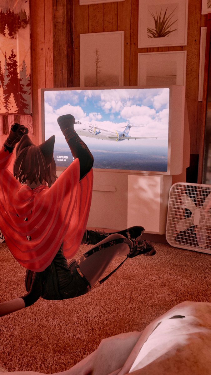 Shh! She’s watching her favorite show!! 

#vrchat #vrchatphotography #vixine