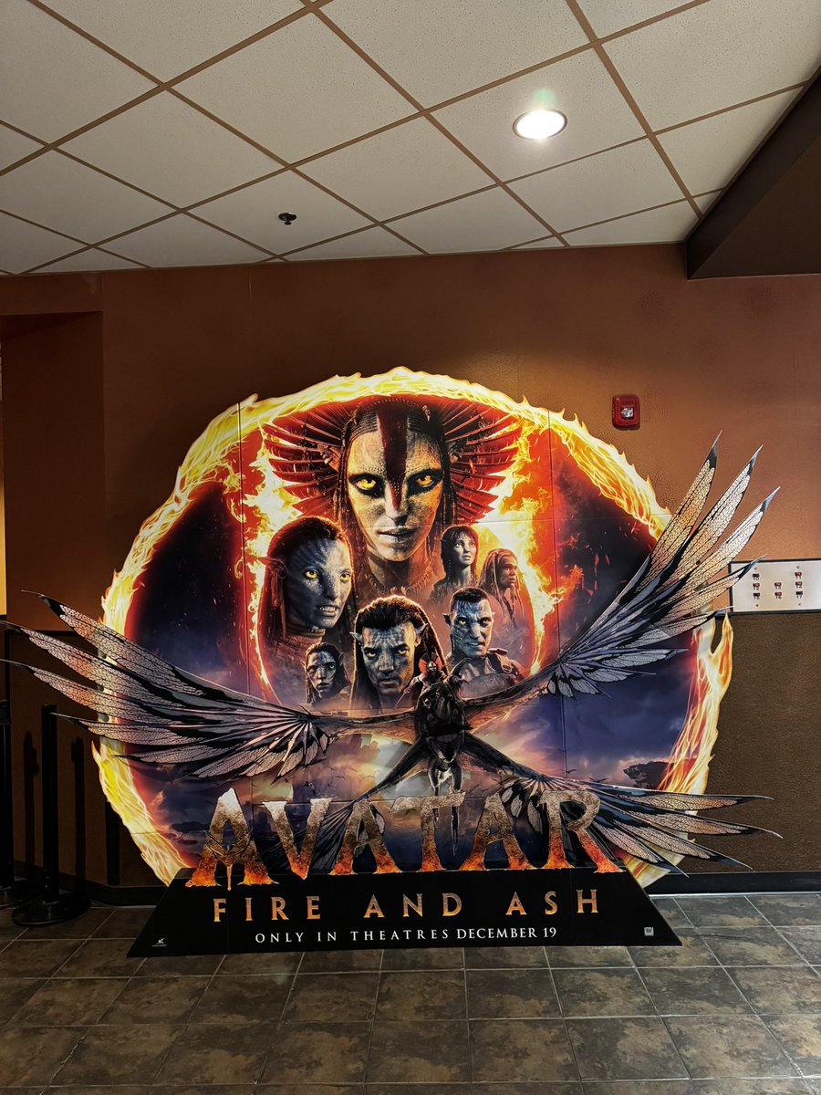 trygraptor's tweet image. absolutely huge and beautiful standee at the theater for Avatar: Fire and Ash