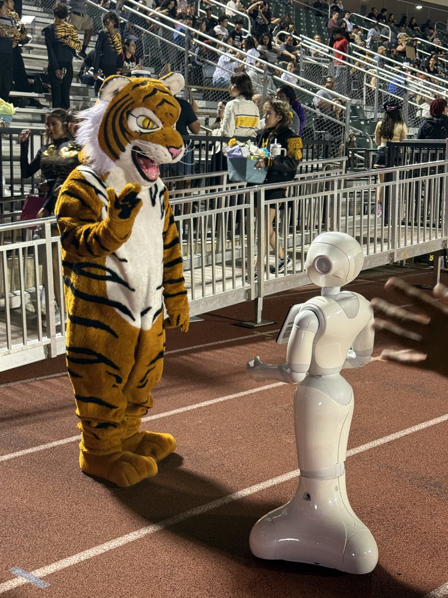 Pepper the robot is nailing it at the <a href="/IrvingHigh/">Irving High School</a> football game! Thank you <a href="/WellsFargo/">Wells Fargo</a> and <a href="/IrvingISD/">Irving ISD</a>