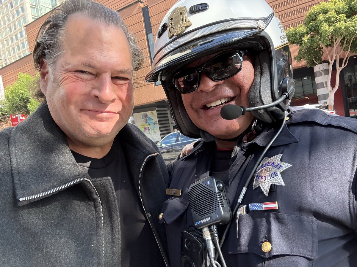 Benioff's tweet image. Safest #Dreamforce ever! 🚓🌉
✅ 50,000+ attendees safely screened 300,000+ times
✅ 22 secure access points
✅ No major incidents
✅ 200 additional officers added
✅ Strong partnerships with @SFPD, @CHP_HQ & @MayorLurie kept neighborhoods safe & clean.
Team effort—thank you all!…