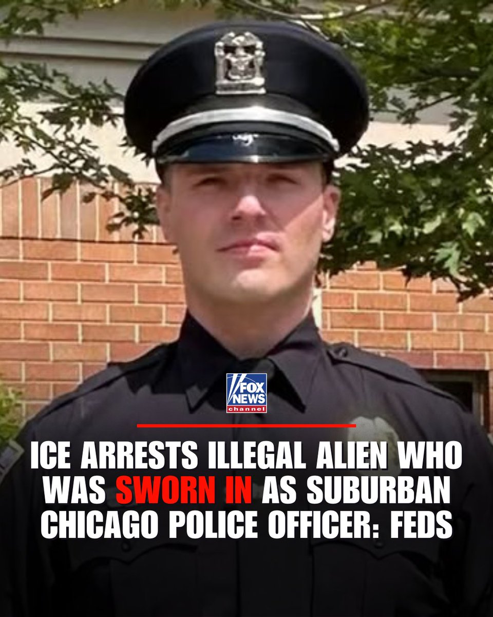 A man wearing a black police uniform shirt and a black cap with a badge stands outdoors in front of a brick wall and green tree branches, facing the camera directly with a serious expression, and the text overlay reads ICE ARRESTS ILLEGAL ALIEN WHO WAS SWORN IN AS SUBURBAN CHICAGO POLICE OFFICER: FEDS along with Fox News branding.