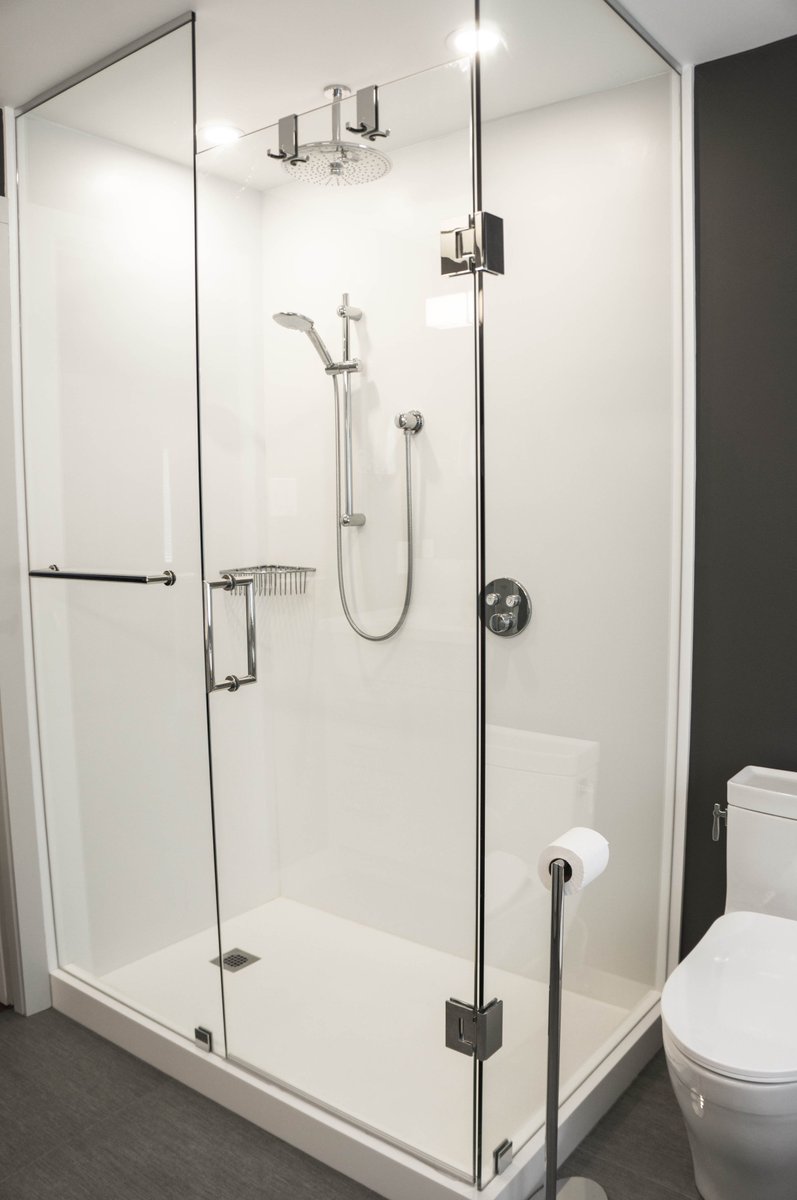OakvilleKitchen's tweet photo. Step into luxury. Our newly renovated bathroom features a custom solid surface shower base and countertop with a sleek glass enclosure — a perfect mix of modern style and practicality. https://t.co/EbEPoWlg4W