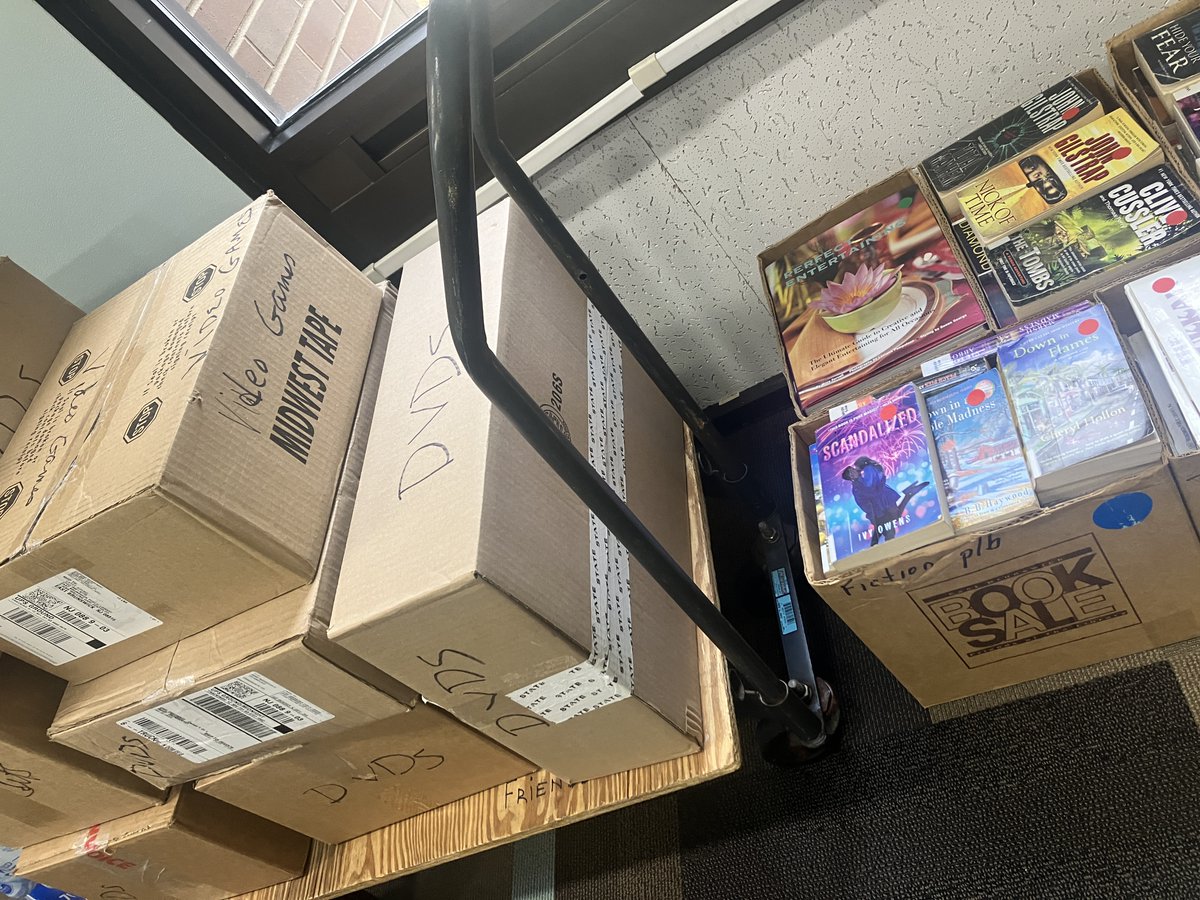 Four more days until the East Brunswick Friends of the Library's 50th Annual Book and Media Sale comes to the library for the first time ever! They spent all afternoon getting books ready! Learn more at ow.ly/YrQv50XcCJ5.