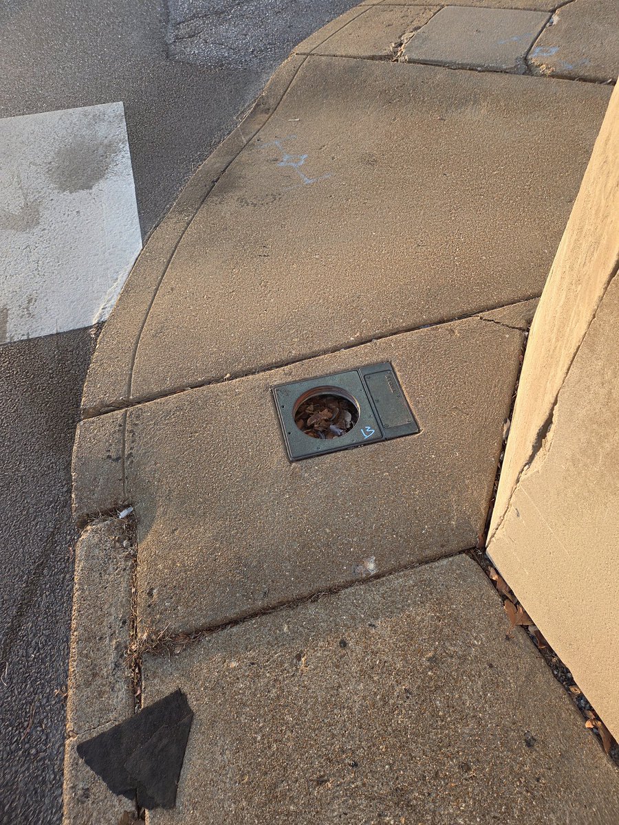 Matty_Gillz's tweet photo. @stlcsb Broken light in the sidewalk at the NE corner of Arsenal and 13th, creating a tripping hadard. Probably supposed to be maintained by @AnheuserBusch ? https://t.co/nnfpFalTuT