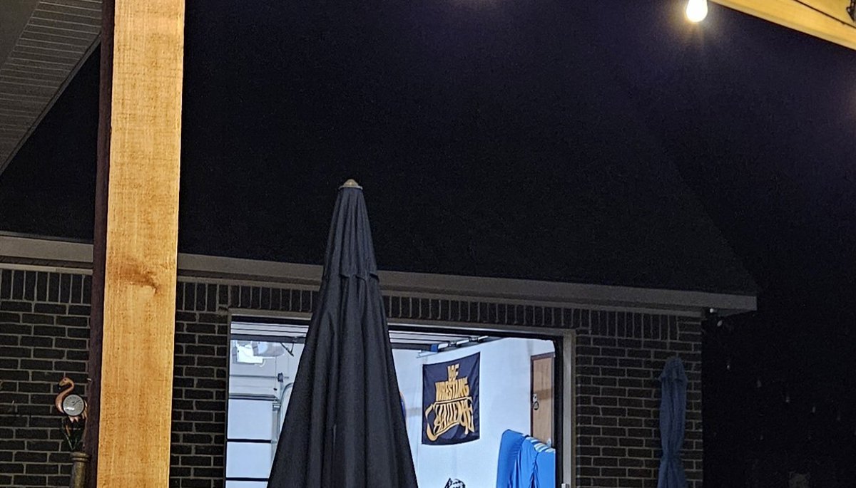RingFocus's tweet image. I love being able to sit in the hot tub and glancing one way to see my WWF Wrestling Challenge flag in my private gym and then turning slightly to the left and seeing  80s wrestling on my television. If you'd told me I'd be doing this almost 40 years later, I would have laughed.