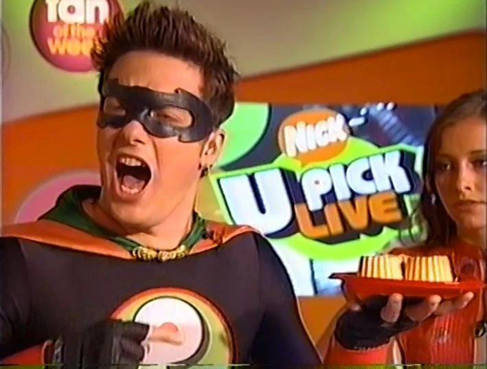 Pick boy is going to help me watch my favorite cartoon.