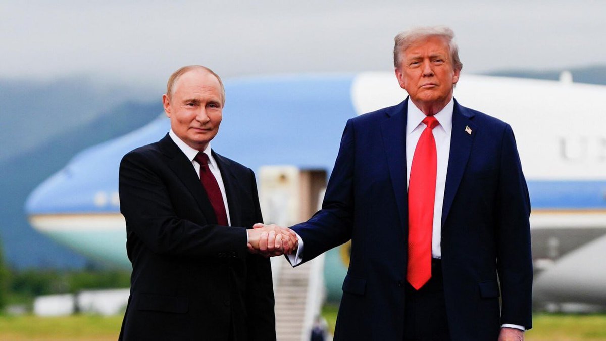 First image shows two men in suits shaking hands in front of a blue and white airplane with US flag markings on a tarmac surrounded by green hills under a cloudy sky. The man on the left has short dark hair and wears a dark suit with a red tie, identified as Vladimir Putin. The man on the right has blonde hair and wears a dark suit with a red tie and American flag pin, identified as Donald Trump. Second image depicts two women standing close together facing each other. The woman on the left has blonde hair in a bob cut and wears a red collared blouse with a small pin, identified as Ursula von der Leyen. The woman on the right has white blonde hair and wears a light beige blouse with a necklace.