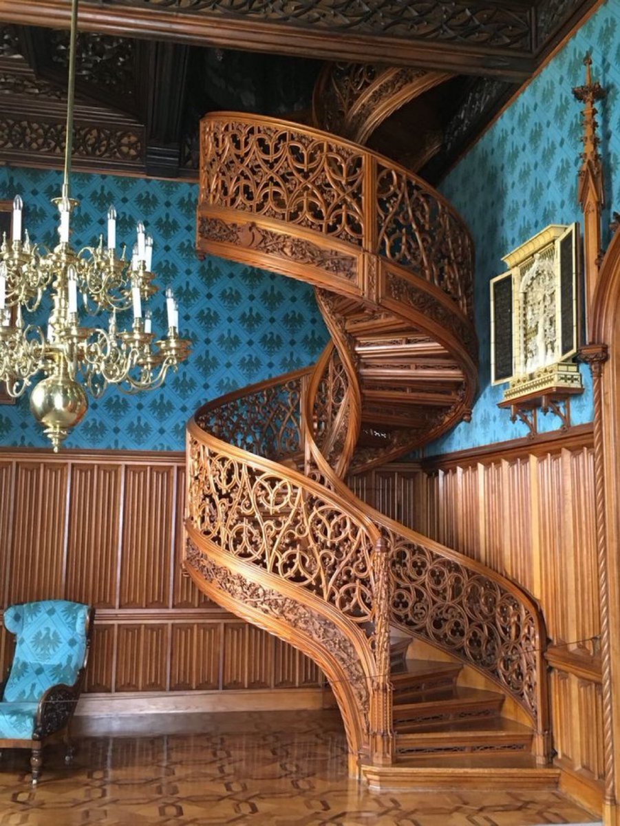 The spiral staircase in Lednice Castle's library made in 1851. 

Carved from a single oak tree without nails