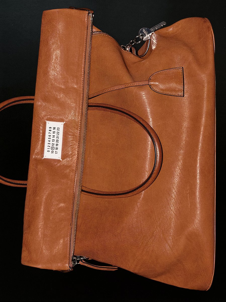 AW25 TECHNIQUES: Maison Margiela explores the beauty of garments transformed over time.

AW25 WORN SHOES: Autumn-Winter 2025 explores wear and memory. Shoes are washed, creased, and set by hand, revealing visible history.

AW25 5AC: Washed, waxed, and finished by hand.