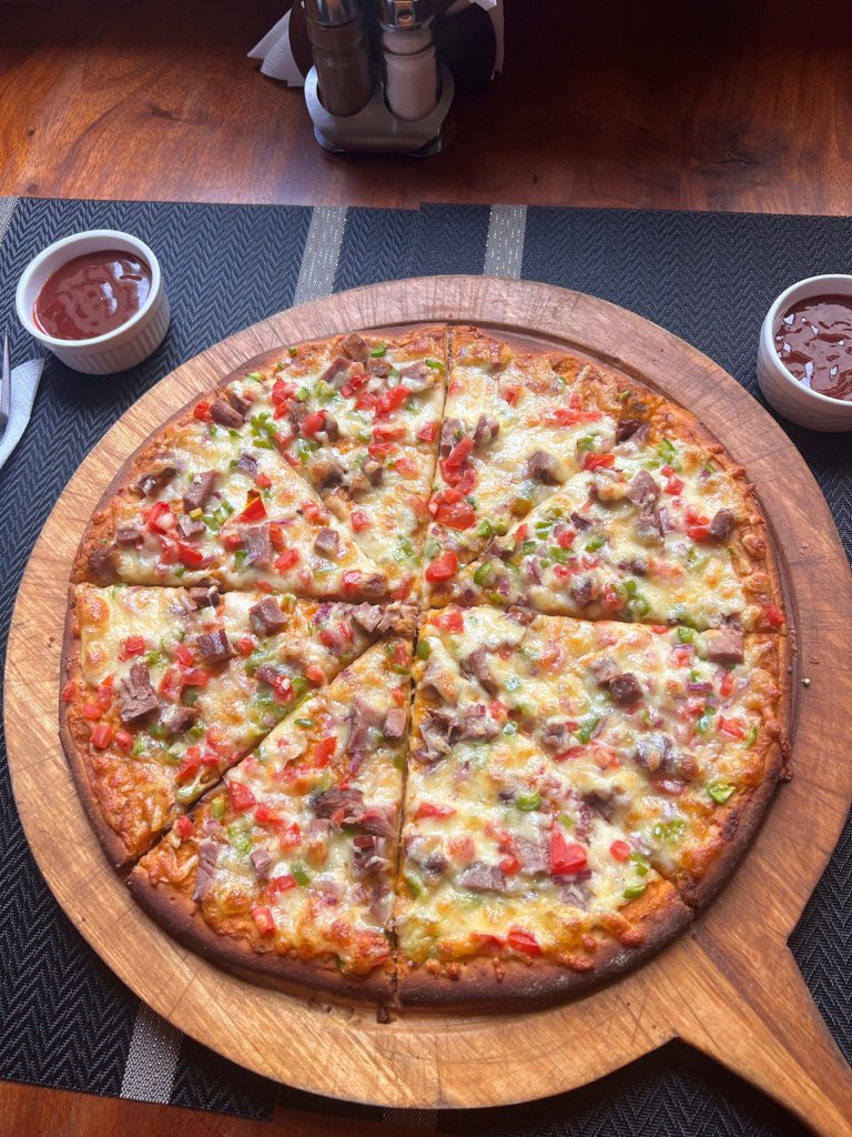 Pizza hits different on Friday. 🍕🔥
Buy 1, and get 1 FREE at Iyosa Restaurant.
📍Wandegeya, Nkizi Rd (opposite UTEL Offices)
📞 +256 759 526880 | +256 771 556765

#IYOSACafeAndRestaurant