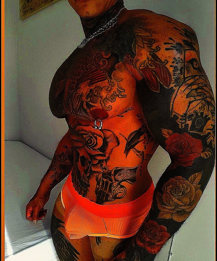 FatBubbleButt20's tweet photo. @PrinceAugustu18 fire orange tattoos come alive—video for his IG drop! 🔥🧡 X is blazing with this epic art—who’s hyped? #PrinceFire #TattooGlow #OrangeBlaze #InkEpic #MuscleArt #XHeat https://t.co/nD2YIemCq9