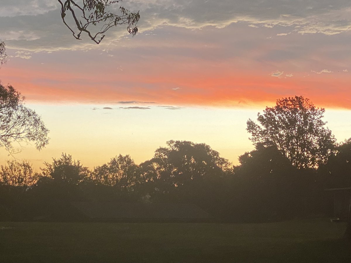 Scarlet-striped post-storm sunset