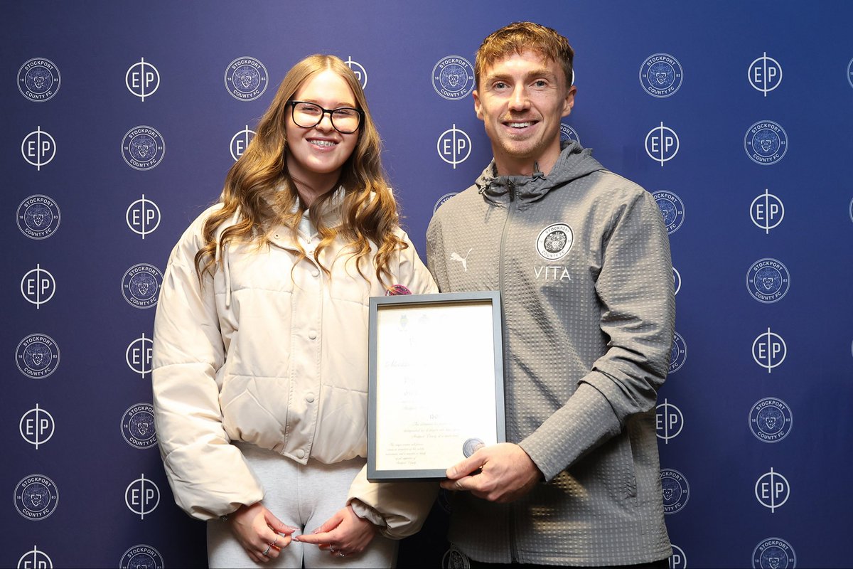 Ben Osborn was presented with his SCAN certificate by Grace McLachlan at Edgeley Park. 11/10/25. #stockportcounty . Photo: Mike Petch
