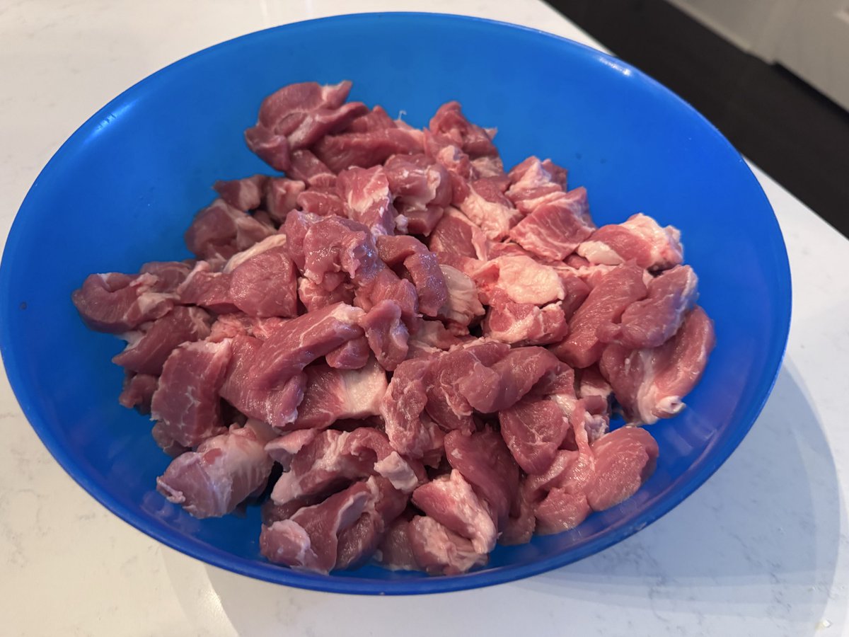 BaconGuRoux's tweet photo. Busy busy morning getting some pork butts sliced up so I can make some tocino and longgonisa while my wife (asawa) will use the other half to make lumpia and pancit.
#FilipinoFood #Kalami #Masarap https://t.co/9t960lJY4Z