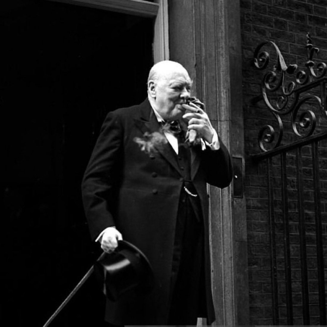 Sir Winston Churchill greets the press outside No. 10 on his final day as premier; 5th April 1955 - age 80.