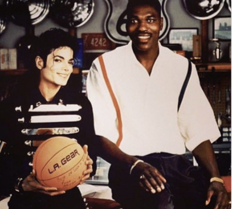 MJJJusticePrjct's tweet photo. Michael Jackson and Hakeem Olaijuwon  LA GEAR photoshoot.  #FlashbackFriday https://t.co/ztq9mIz4Kk