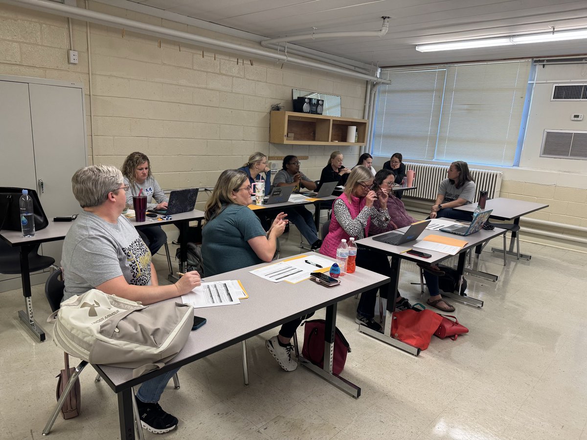 Science teachers collaborating and planning for the future.