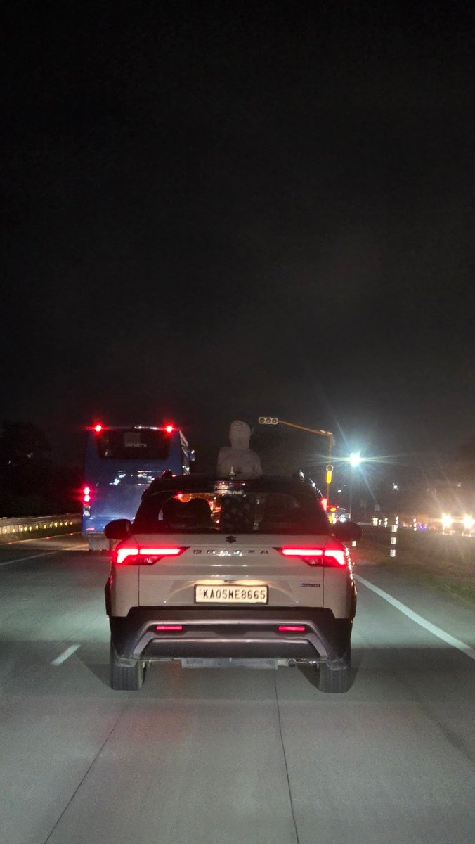 RBarui's tweet image. @BlrCityPolice @blrcitytraffic  This white Maruti Brezza KA05NE8665 kept driving on Nice road with a kid standing out of sunroof. Speed was above 80kmph. Please take necessary action.