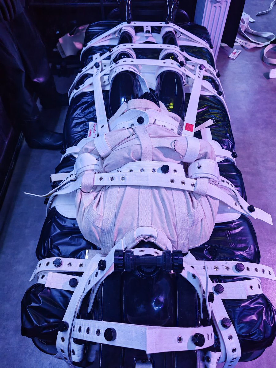 You enter the room, your faith awaits you... The heavy bundle of white canvas and belt will soon be tightly ordered all over your body.
  Don't worry you will just have to wait for your warden to untie you, eventually. Focus on your breathing it's your sole and last liberty.