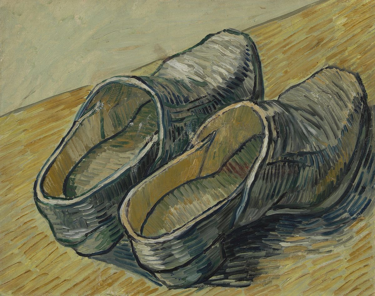 A Pair of Leather Clogs