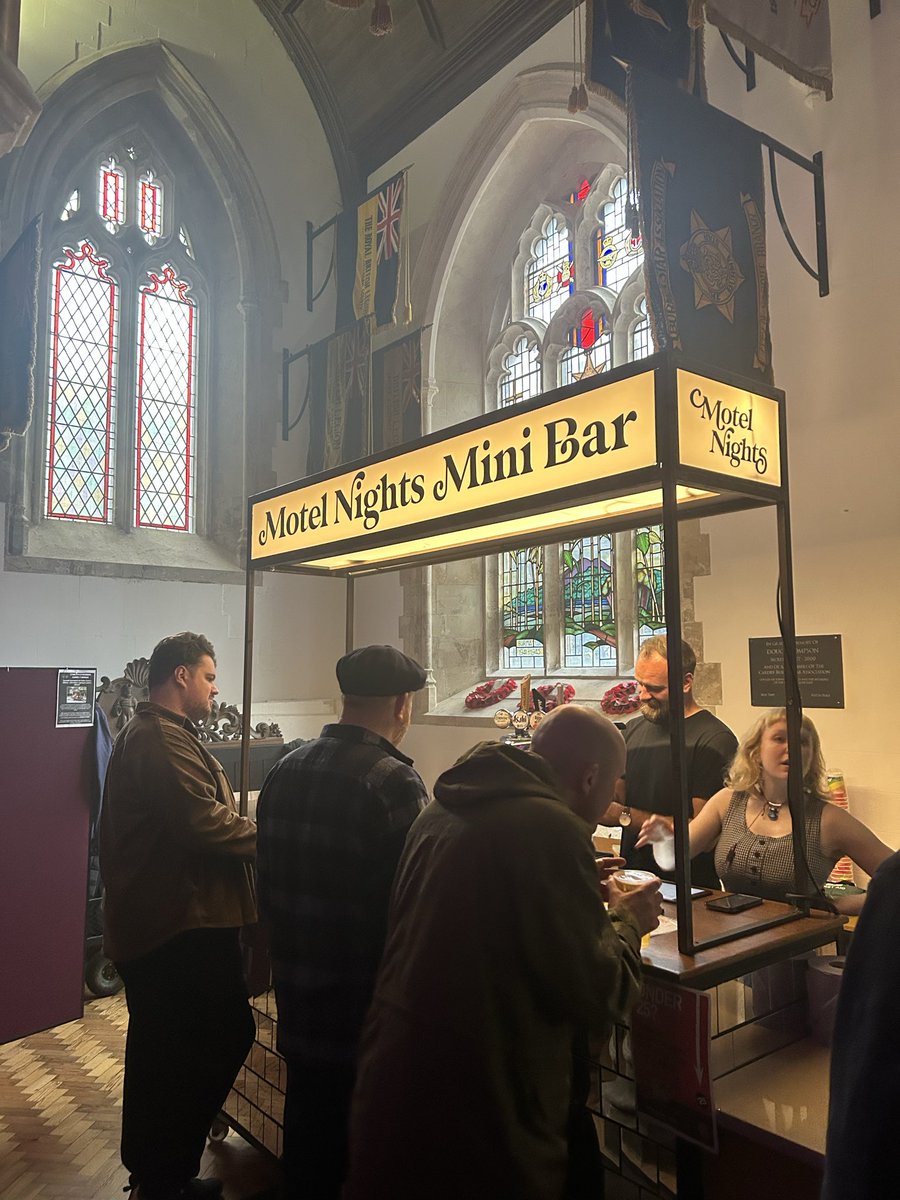 Gavinallen's tweet photo. @ClwbIforBach @SwnFestival St John’s Church is hosting gigs for the first time @SwnFestival 

There’s a pop-up bar by Motel Nights and a fair few flight cases under the stained glass windows. 

The Reverend Canon Sarah Jones is on the door to greet the crowd. 

Beautiful venue. https://t.co/Nn1Dl8R8r8