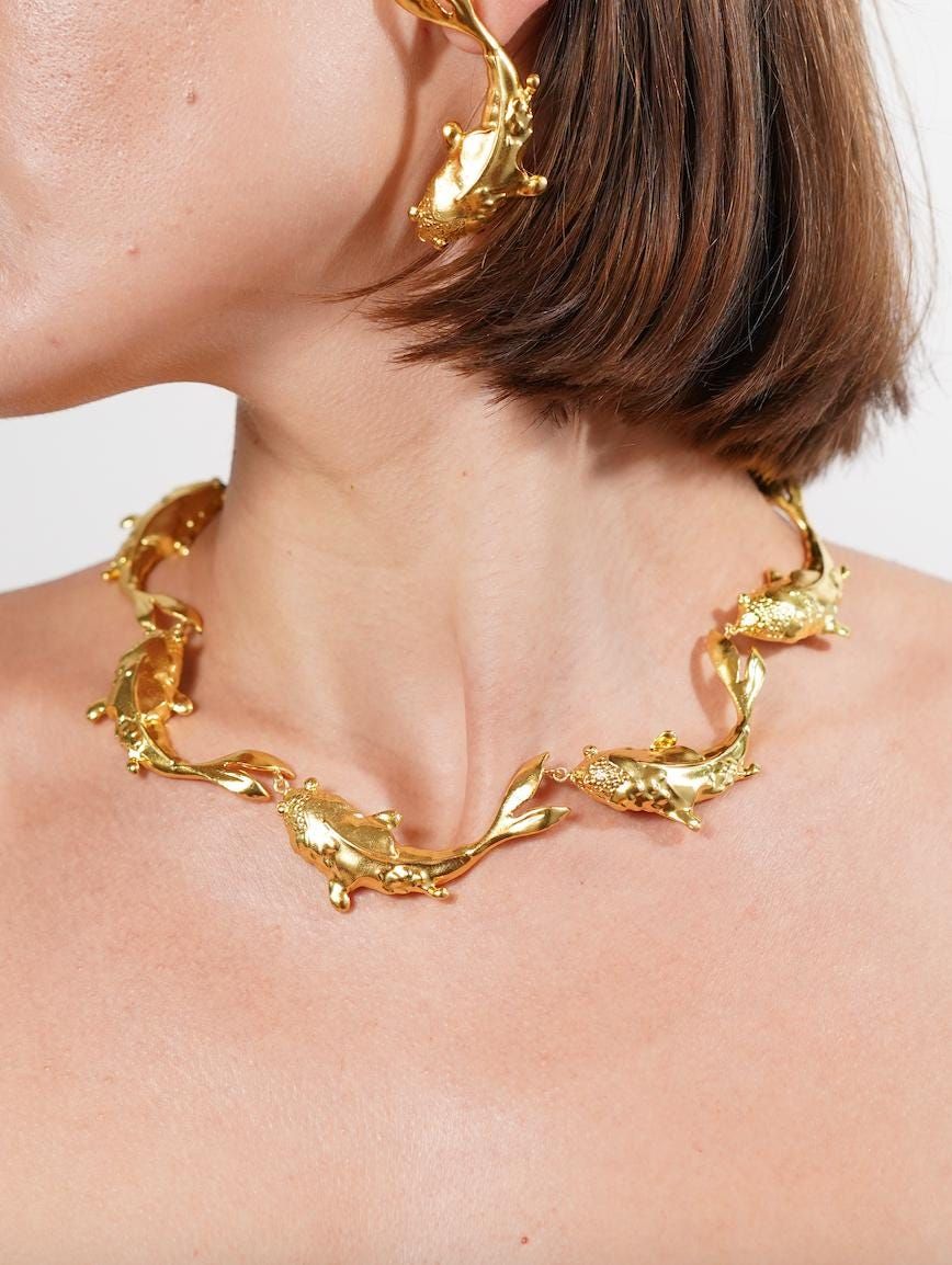 JewelsMatsya's tweet photo. Bold &amp; symbolic. 🐠 Our 22K Gold Choker Necklace with Koi Fish design. Redefine luxury. #MatsyaJewels #GoldChoker #KoiFish #22KGold https://t.co/ry2jMLaGf2
