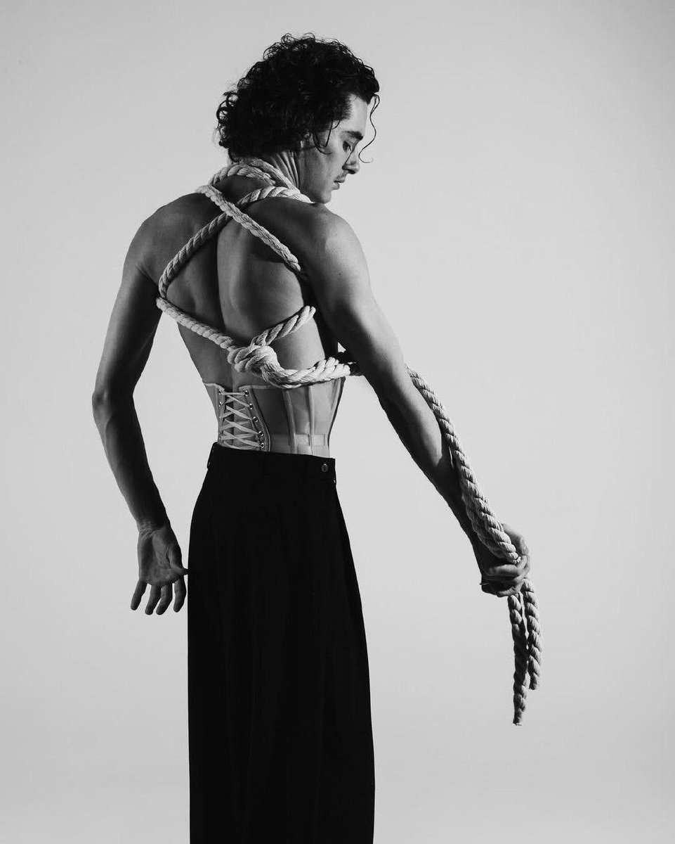 i can feel the flames on my skin
        crimson red paint on my lips..
i don't regret it one bit,
                         'cause he had it comin'
they say i did something bad..

        then why's it feel so good?