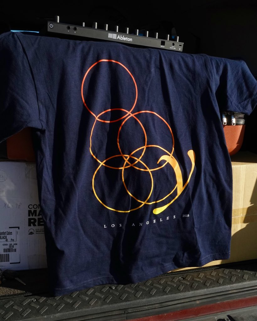Los Angeles 2025 tshirts will be available tonight at our show at the Moroccan Lounge. Sunset split fountain gradient logo on navy blue shirt w white LA ‘25 accent. In My Town MAXI cds and Kentucky blue logo tees will be available too.