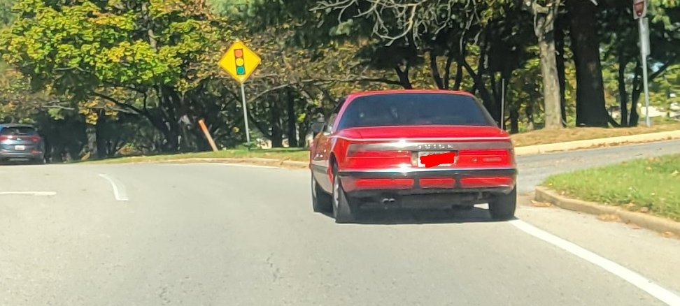 Having someone merge right in front of you at like 0 speed sucks, but is made slightly more acceptable when it's a Buick Reatta