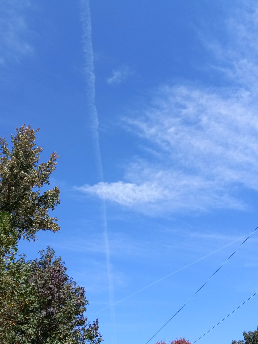 Phone doesn't do sky photos well,  several chemtrails horizon to horizon. Didn't see any for a few days but they're back spraying their extremely toxic chemicals.  

jews.
