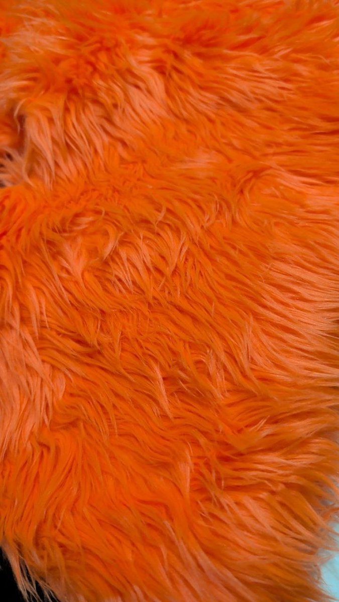 Back in the day, if you wanted colors on your fursuit, your option was THIS texture, in maybe 20ish colors. One single shade of grey. It looks good when brushed and then scraggly again in 5 mins. Made 100% of a bodysuit!

This is 2010s-era lux shag from Shannon/DF/Fabric(dot)com.