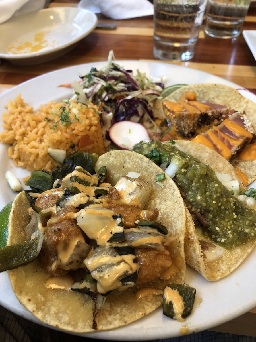 Three types of tacos. Brisket. Tempura battered shrimp. And seared aha tuna