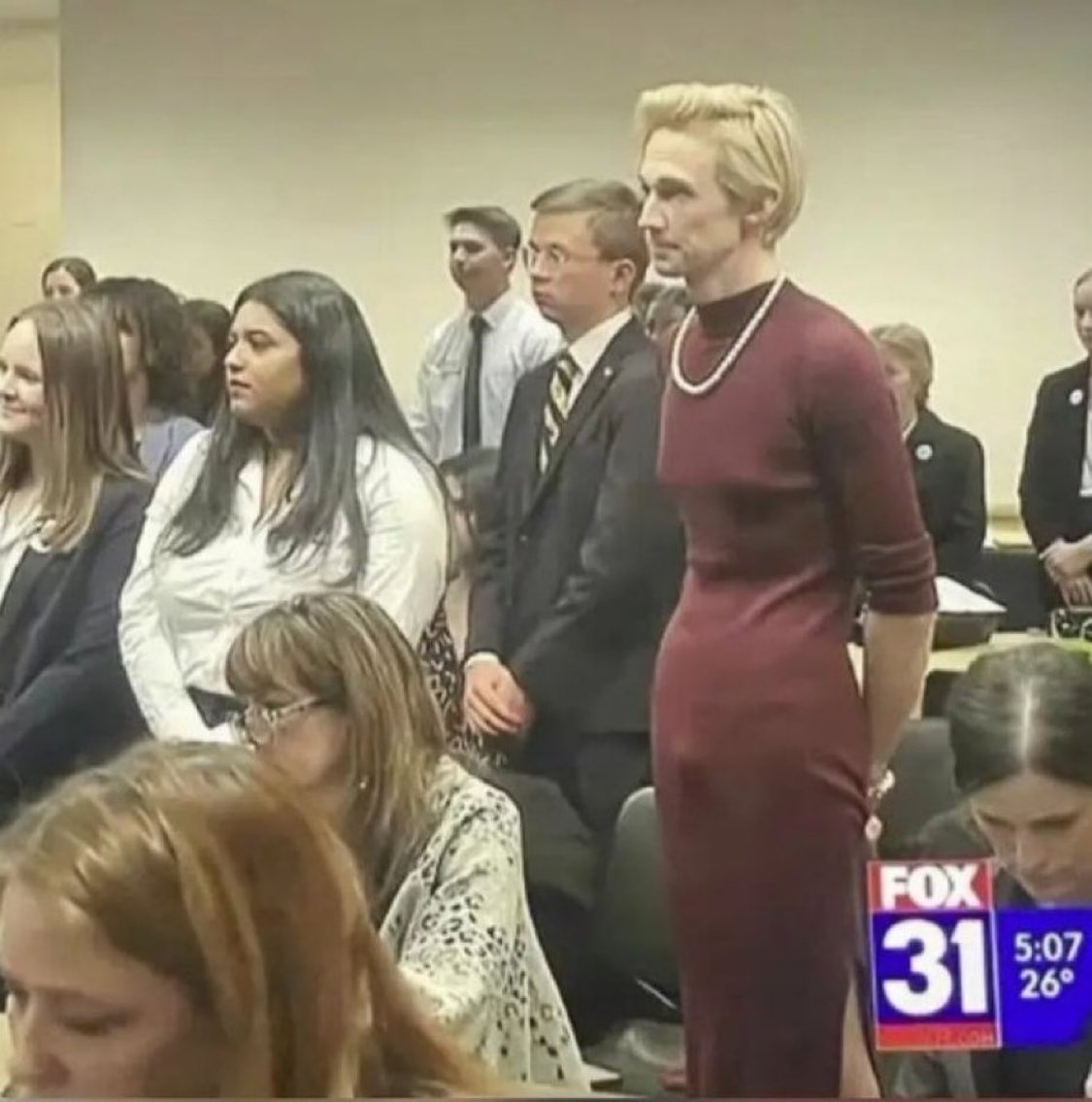 its_The_Dr's tweet image. What do you think about the woman in the burgundy Dress?