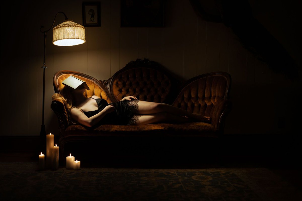 Inspiration for a perfect October evening. 📚🕯️ Self portrait by muse Ava Rymer wearing Jane's Vanity.