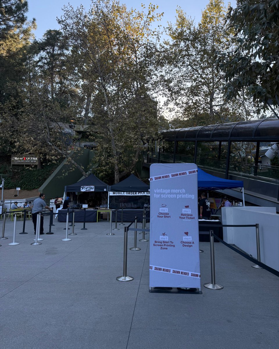 ShawnAccess's tweet image. The #ShawnOnTheRoadAgain vintage merch pop up and screen printing are back for our last show tonight. If you’re at #OnTheRoadAgainLA, head to the box office roof across from tour merch in front of Escalator 1 to get your favorite merch pieces from over the years, and get them…