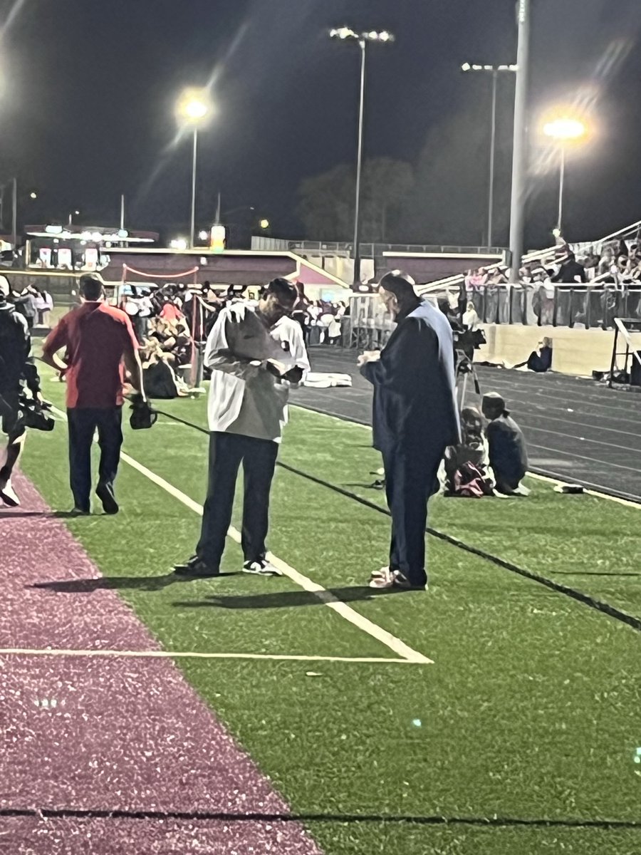 Illini head coach Bret Bielema, right, on the sidelines. He’s likely here to see Dunlap soph. Bo Sutter and Morton jr. Soren Fifer, who both have Illinois offers. 

I believe that’s Alabama TE coach Bryan Ellis on the left.